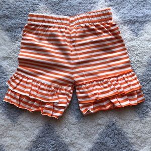 Boutique ruffle shorts orange/white multiple sizes